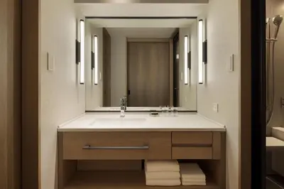 a bathroom with a sink and a mirror at Sheraton Miyako Hotel Tokyo in Tokyo