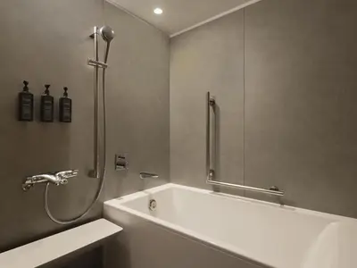 a bathroom with a shower and a bath tub at Sheraton Miyako Hotel Tokyo in Tokyo