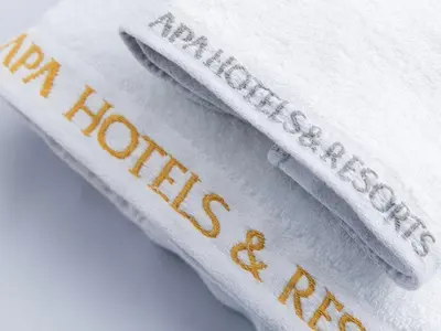 three white towels with the words harry potter on them at APA Hotel TKP Tokyo Nishi-Kasai in Tokyo
