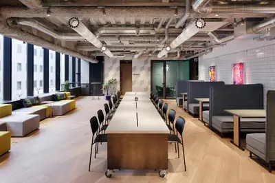 a conference room with a long table and chairs at The Millennials Shibuya in Tokyo