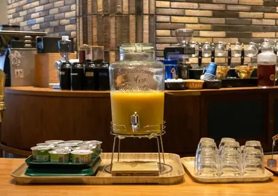 a drink in a glass jar on a tray on a table at Ours Inn Hankyu in Tokyo