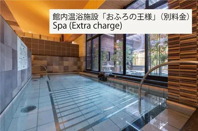 a swimming pool in a building with at Ours Inn Hankyu in Tokyo