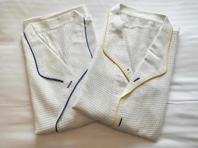 two white vests with blue and yellow zipper at Citadines Shinjuku Tokyo in Tokyo