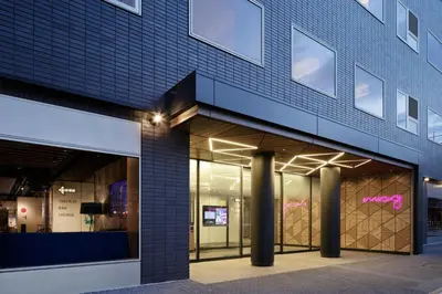 a facade of a building with a store at MOXY Tokyo Kinshicho in Tokyo
