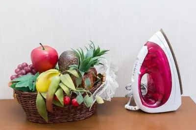 a basket of fruit on a table next to a toaster at Shinjuku Apartments 101 in Tokyo