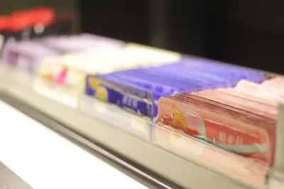 a shelf with different colored containers on it at Hotel Sardonyx Tokyo in Tokyo