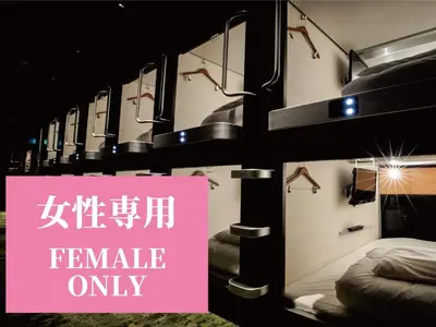 a room with a pink sign that reads female only at Glansit Akihabara in Tokyo