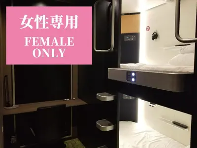 a sign that says female only in a train at Glansit Akihabara in Tokyo