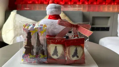 a package of cookies with a santa claus on top at Henn na Hotel Tokyo Hamamatsucho in Tokyo