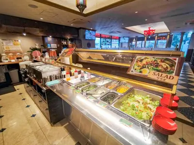 a buffet line in a fast food restaurant at Henn na Hotel Tokyo Asakusabashi in Tokyo
