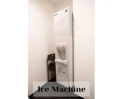 a ice machine in a room with the words ice ice machine at Henn na Hotel Tokyo Akasaka in Tokyo