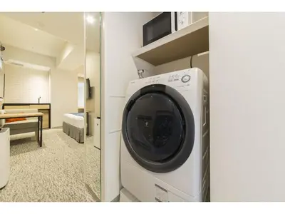 a washer and dryer in a room at Tokyu Stay Takanawa Shinagawa Area in Tokyo