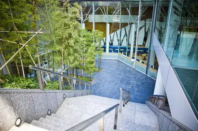 a view from the top of a building with a bench at Tokyo Green Palace in Tokyo