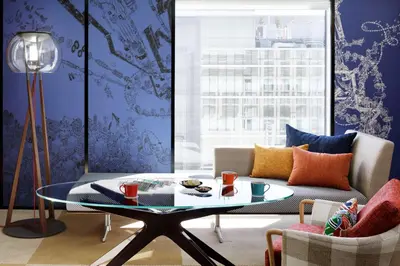 a living room with a table and a couch at Hyatt Centric Ginza Tokyo in Tokyo