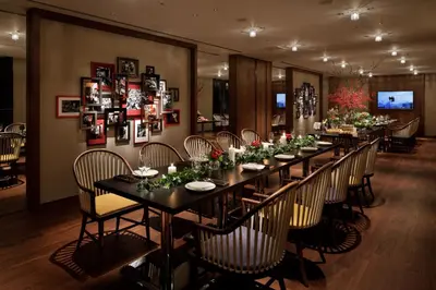 a long dining room with a long table and chairs at Hyatt Centric Ginza Tokyo in Tokyo