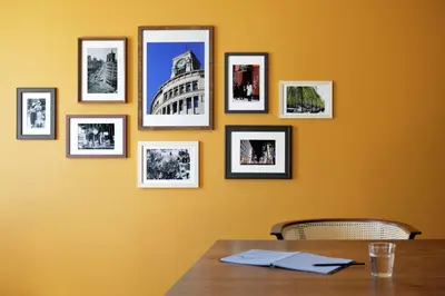 a dining room with a table and pictures on the wall at Hyatt Centric Ginza Tokyo in Tokyo
