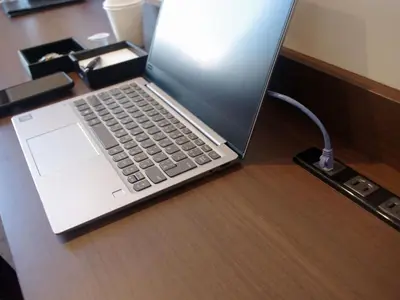 a laptop computer sitting on top of a desk at Tosei Hotel Cocone Kanda in Tokyo