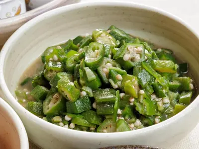 a white bowl filled with green beans and other vegetables at Nishitetsu Inn Shinjuku in Tokyo