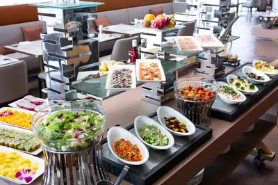 a buffet line with many different types of food at The Prince Park Tower Tokyo - Preferred Hotels & Resorts, LVX Collection in Tokyo