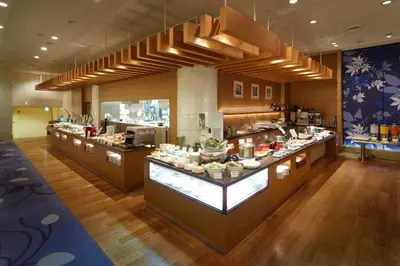 a kitchen with a buffet line in a restaurant at Grand Prince Hotel Takanawa in Tokyo