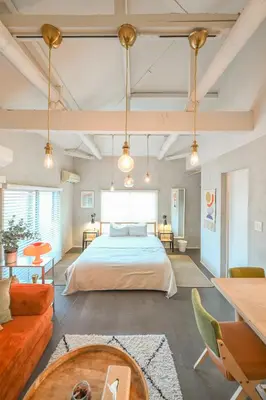 a large bedroom with a bed and a couch at 846 apartment in Tokyo