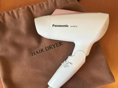 a hair dryer sitting on top of a table at HOTEL MYSTAYS Maihama in Urayasu