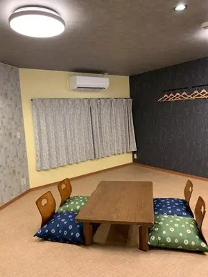 a room with a table and chairs and a window at HOTEL PRELE Asakusa \u30db\u30c6\u30eb\u30d7\u30ec\u30fc\u30eb\u6d45\u8349 in Tokyo