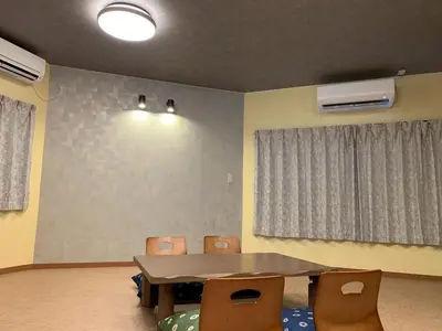 a conference room with a table and chairs and a table and chairs at HOTEL PRELE Asakusa \u30db\u30c6\u30eb\u30d7\u30ec\u30fc\u30eb\u6d45\u8349 in Tokyo
