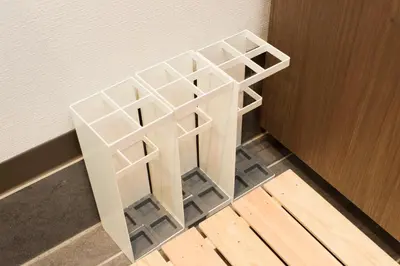 a white shelf in a room next to a door at Ryoma Ikebukuro in Tokyo