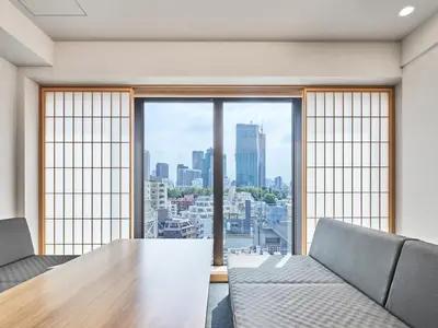 a conference room with a table and chairs and a large window at MIMARU Tokyo Akasaka in Tokyo