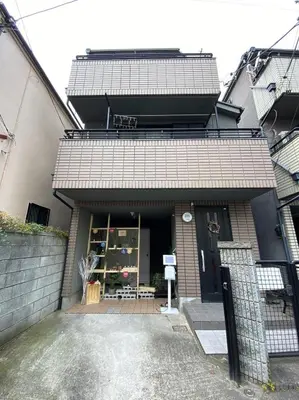 a store front of a house with a building at Ikken House in Tokyo