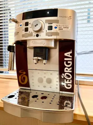 a coffee maker sitting on top of a box at bnb+ Shinbashi in Tokyo
