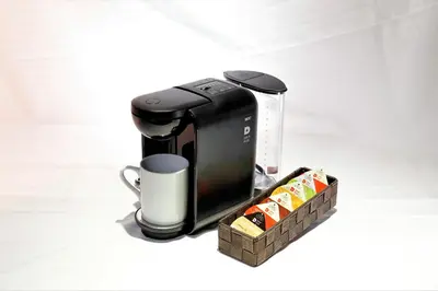 a coffee maker and a cup of coffee at Act Hotel Roppongi in Tokyo