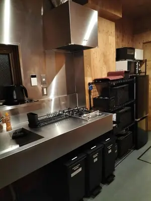 a kitchen with a stove and a counter top at Vacation