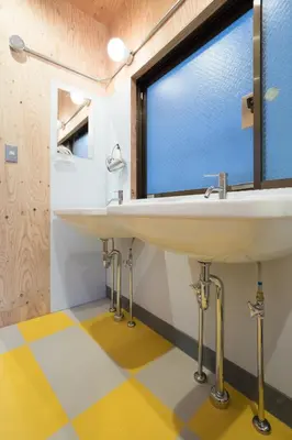 a bathroom with a sink and a window at Vacation