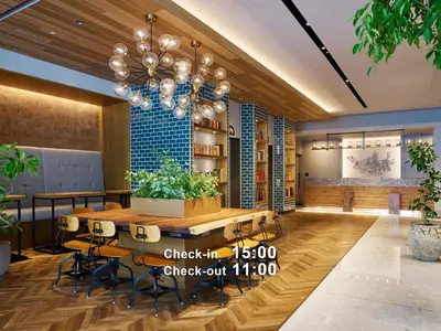 a dining room with a table and chairs and a chandelier at Mitsui Garden Hotel Otemachi - Tokyo in Tokyo