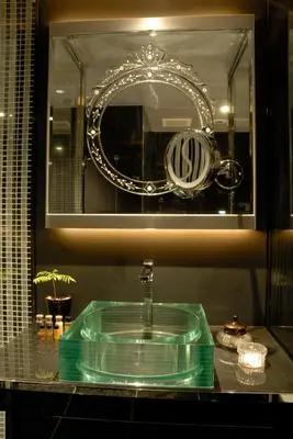 a bathroom with a green sink and a mirror at HOTEL THE GLANZ in Tokyo