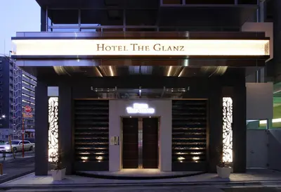 a building with a sign that reads hotel the chain at HOTEL THE GLANZ in Tokyo