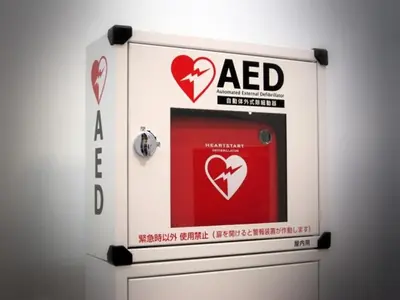 a door with a red box with a red heart at Urayasu Sun Hotel in Urayasu