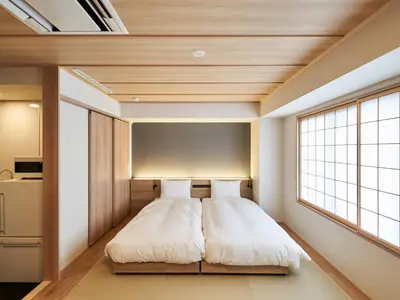 a bed in a room with a large window at MIMARU Tokyo Nihombashi Suitengumae in Tokyo