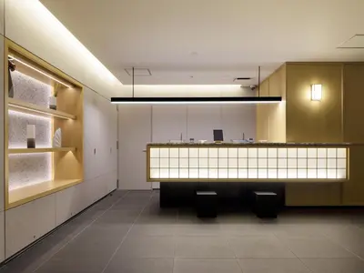 a lobby with a reception desk in a building at MIMARU Tokyo Nihombashi Suitengumae in Tokyo
