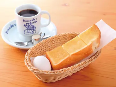 a basket of bread and an egg and a cup of coffee at 9h nine hours Akasaka in Tokyo