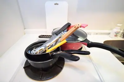 a pot with utensils in it on a kitchen counter at Square Shibuya 407 in Tokyo