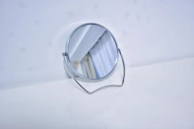 a mirror is hanging on a ceiling at Square Shibuya 407 in Tokyo