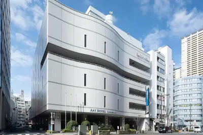 an art tech building in a city at ART HOTEL Nippori Lungwood in Tokyo