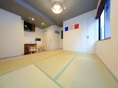 an empty room with a table and a dining room at COTO Tokyo Asakusa 4 in Tokyo