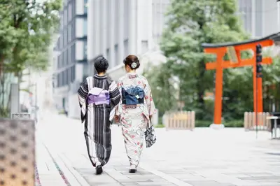 two women walking down a city street at Mandarin Oriental, Tokyo in Tokyo