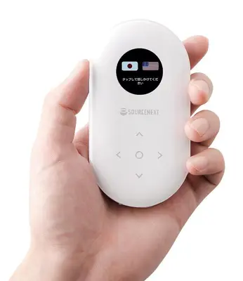a hand holding a wii remote control at Hotel Route-Inn Tokyo Asagaya in Tokyo