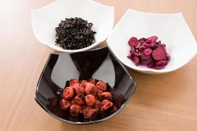 three bowls of food on a wooden table at Hotel Route-Inn Tokyo Asagaya in Tokyo