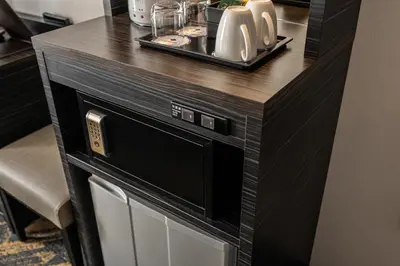 a counter in a hotel room with a microwave at HOTEL MYSTAYS Hamamatsucho in Tokyo